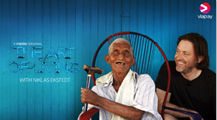 An old person sitting in a chair

AI-generated content may be incorrect.