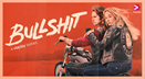 A person and person sitting on a motorcycle

Description automatically generated