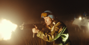 A person in a helmet holding an object

AI-generated content may be incorrect.